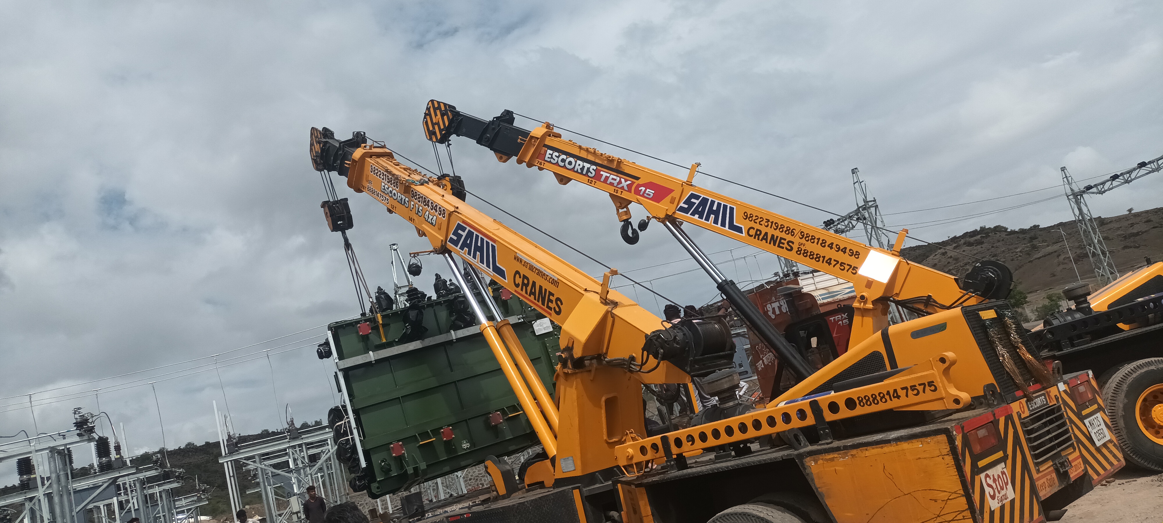 Electrical substation work — twin-crane transformer lift